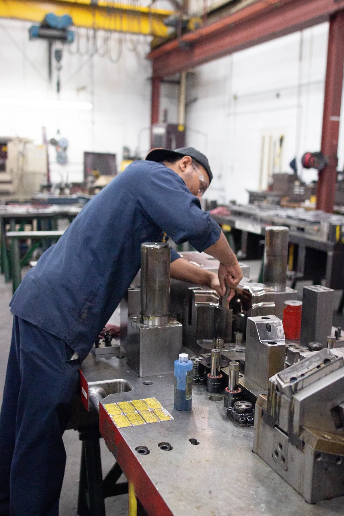 A Clover tool maker at work in the tool room.