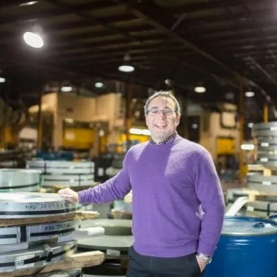 George Zeni, Vice-President and Sales Manager, in the coil staging area at Clover.